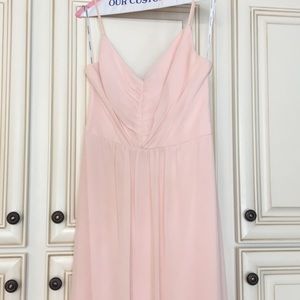 Light pink floor length gown.